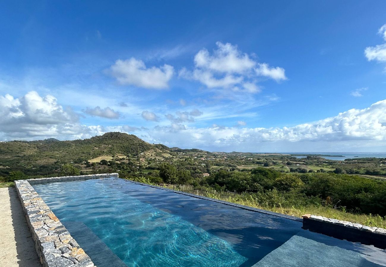 Villa à Le Marin - Cottage de standing - OKO - Piscine et vue mer 